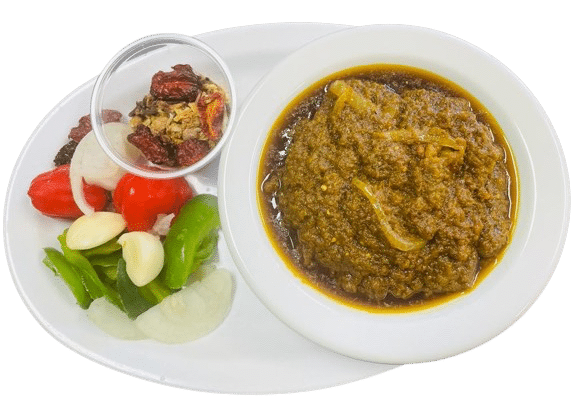 African Fusion Restaurant: Photo of Ayamase stew--a blend of assorted peppers, ginger garlic seasoned with Iru (locust beans) without meat. Eat over rice.