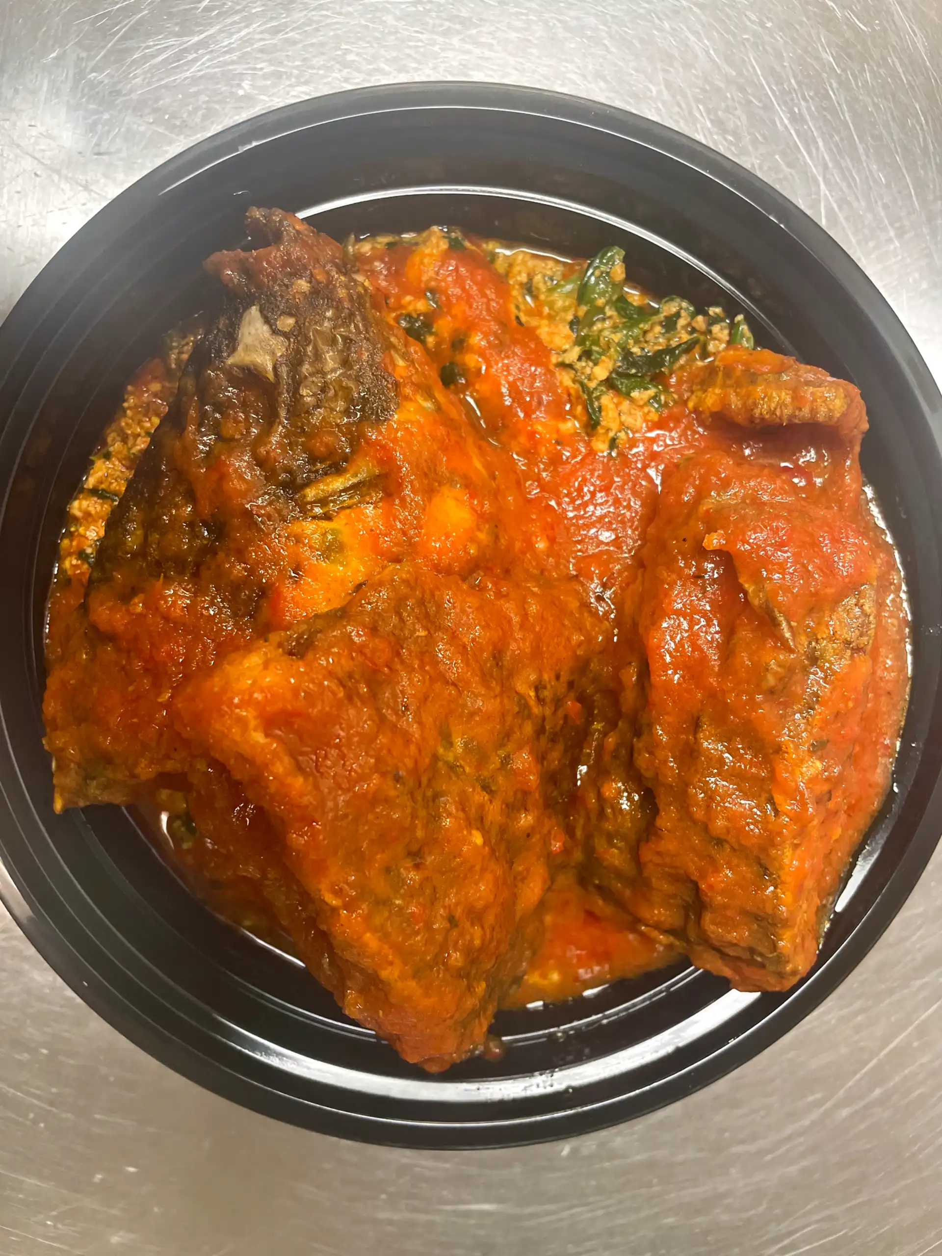 Tilapia in egusi stew